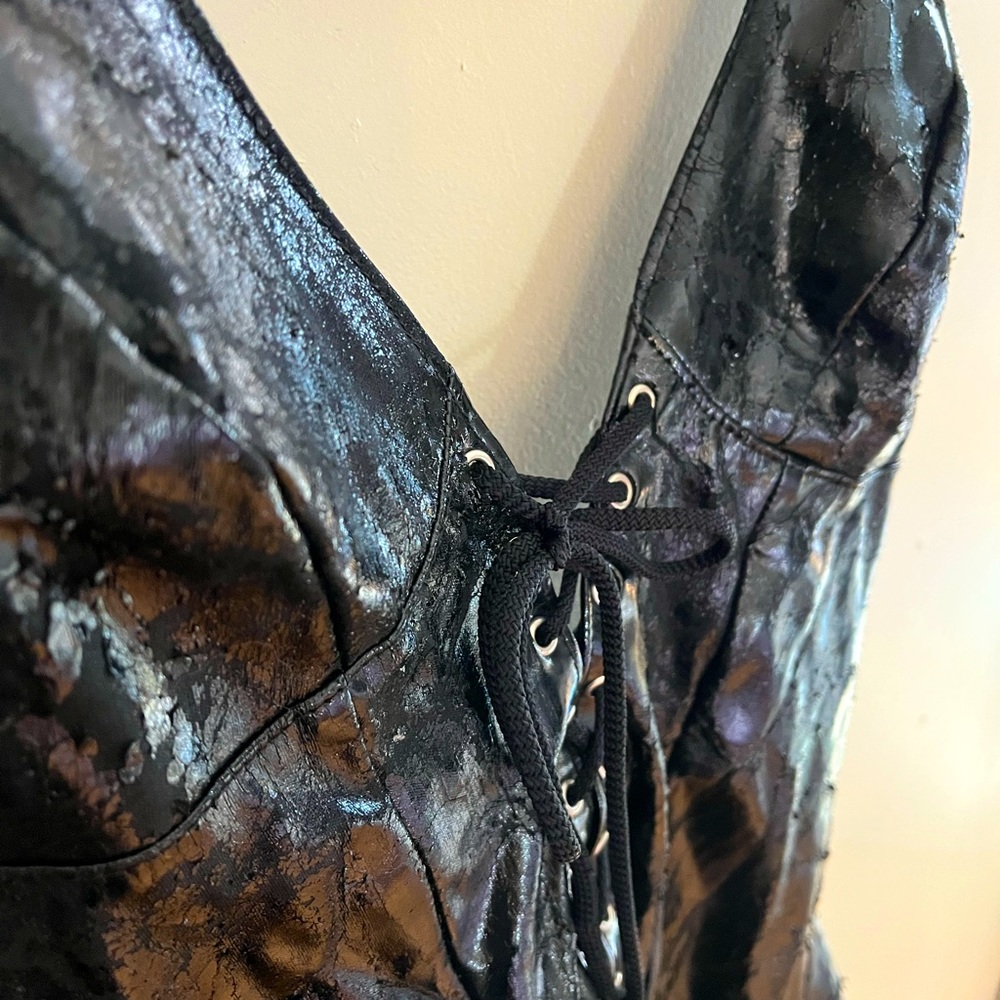 This sexy cracked “patent leather” halter dress is rough.